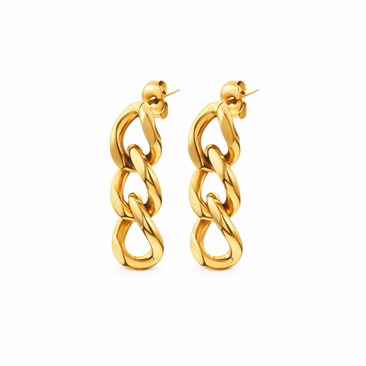 gold chain earrings on white background