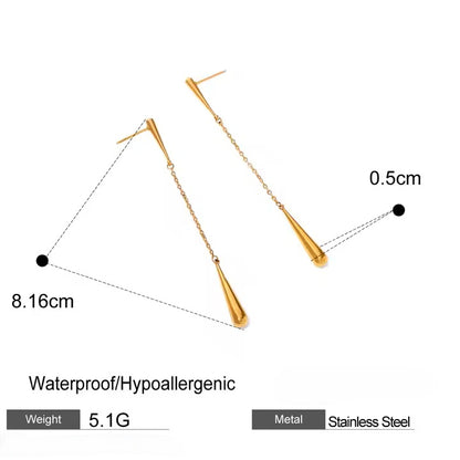Gold earrings with measurements and material details on a white background