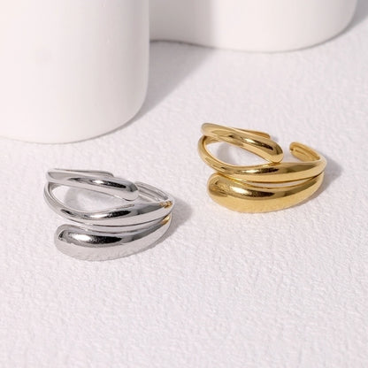silver and gold tarnish-free rings on white background