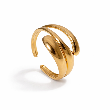 Gold spiral ring on a white background