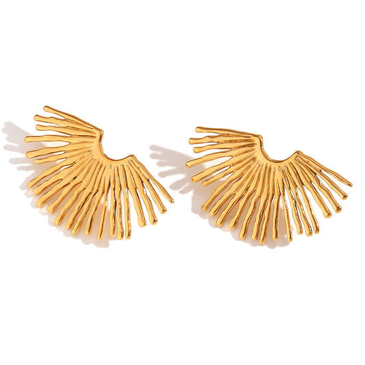 Gold fan-shaped earrings on a white background