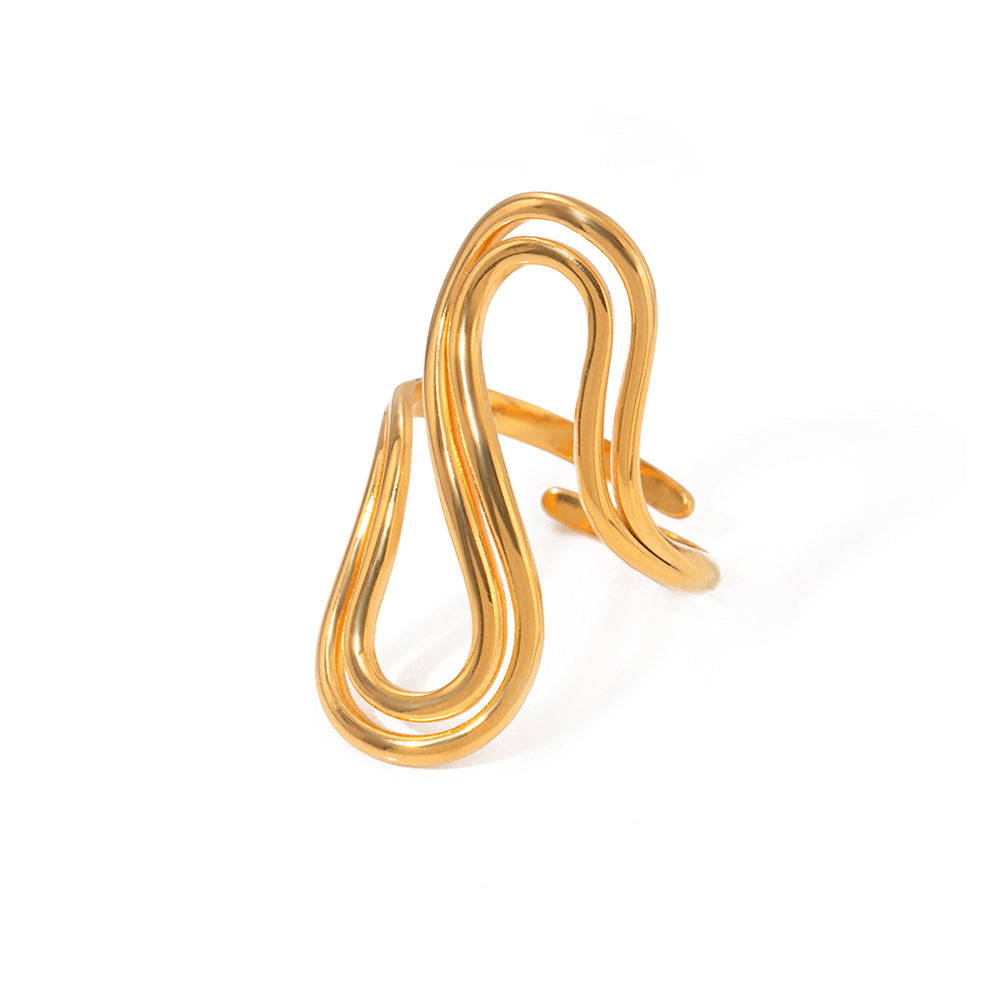 Gold ring with a wavy design on a white background