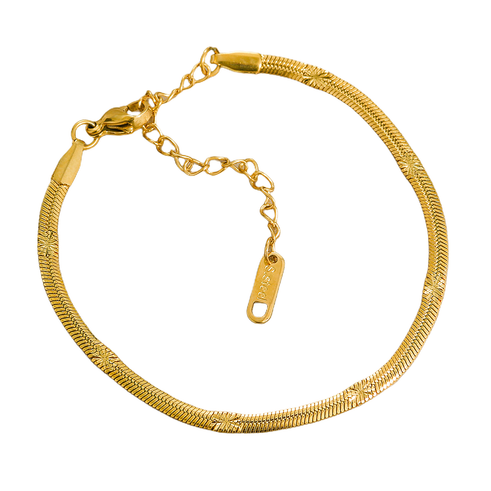 Gold stainless steel bracelet on a white background