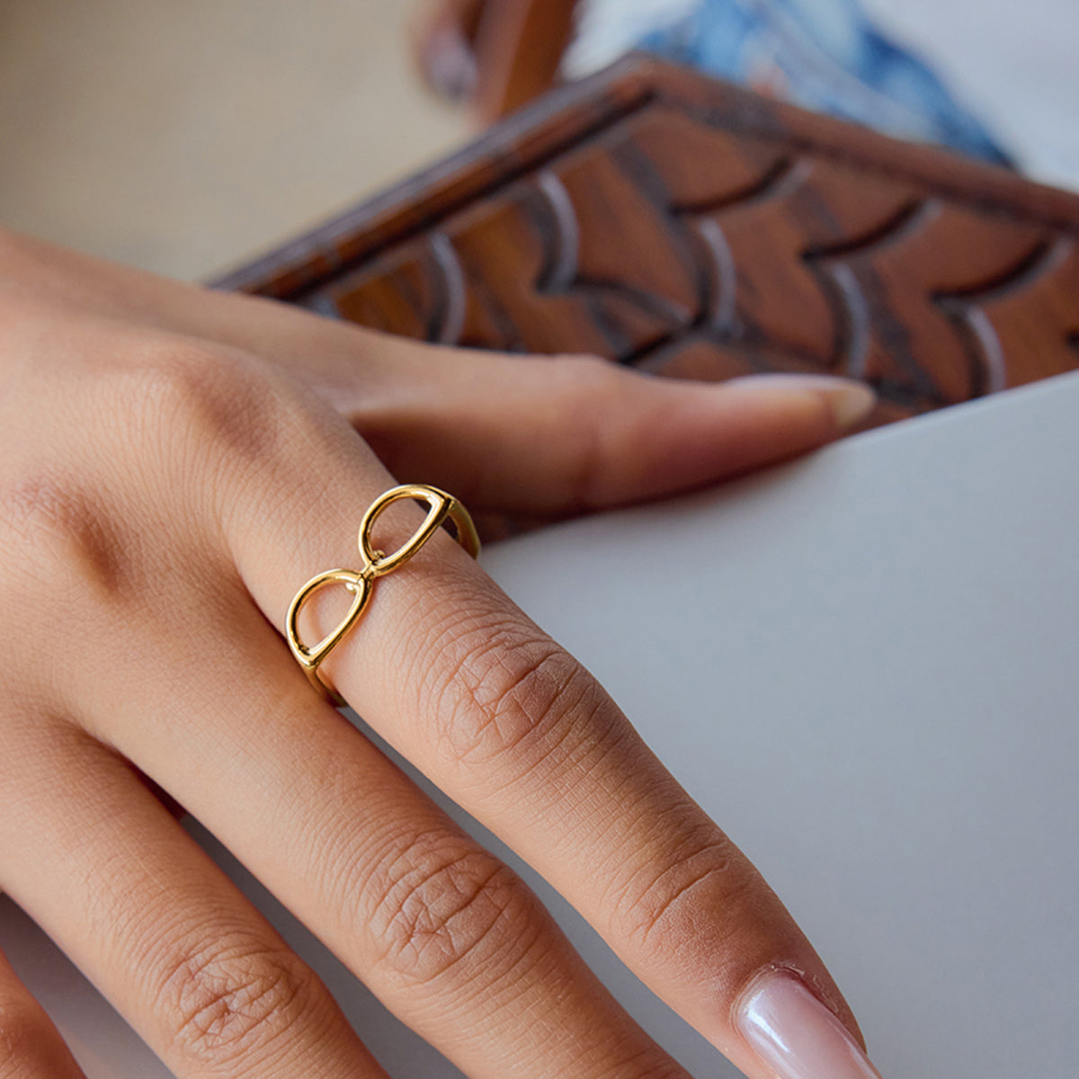 Gold funny ring on a finger