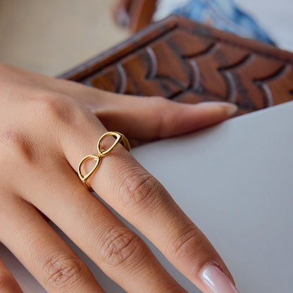 Gold funny ring on a finger
