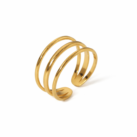 gold stainless steel ring on white background