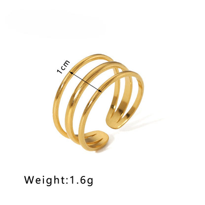 waterproof gold ring with triple design on a white background with measurements