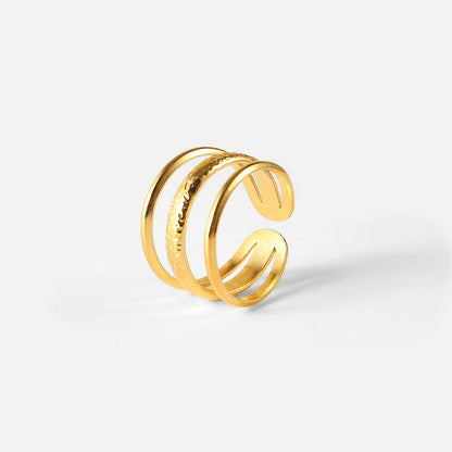 tarnish-free gold ring on white background
