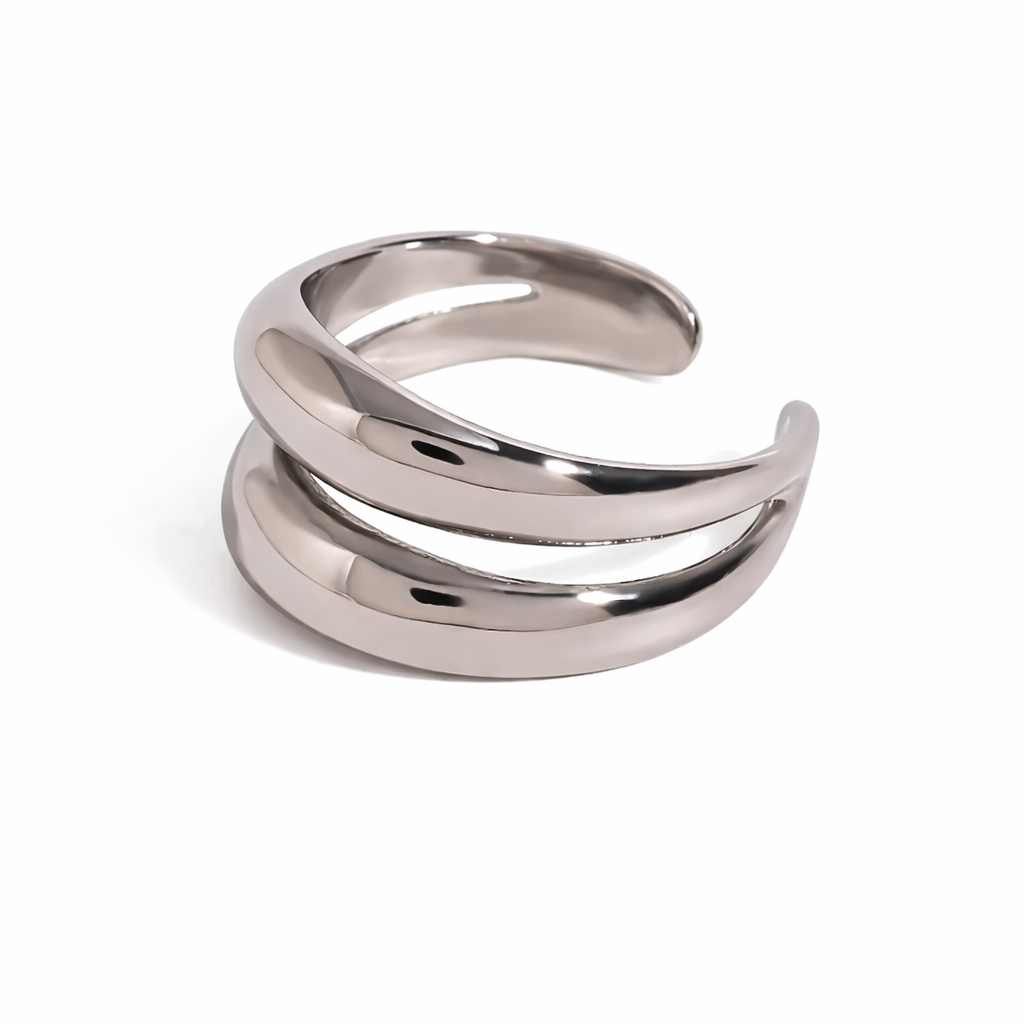 Silver stainless steel ring with a modern design on a white background