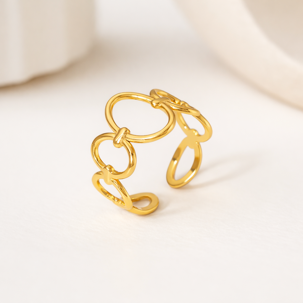 tarnish-free gold ring on white background