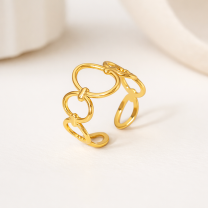 tarnish-free gold ring on white background