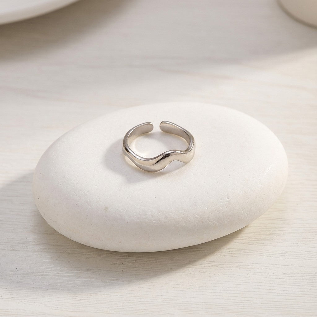 silver waterproof ring on a white stone