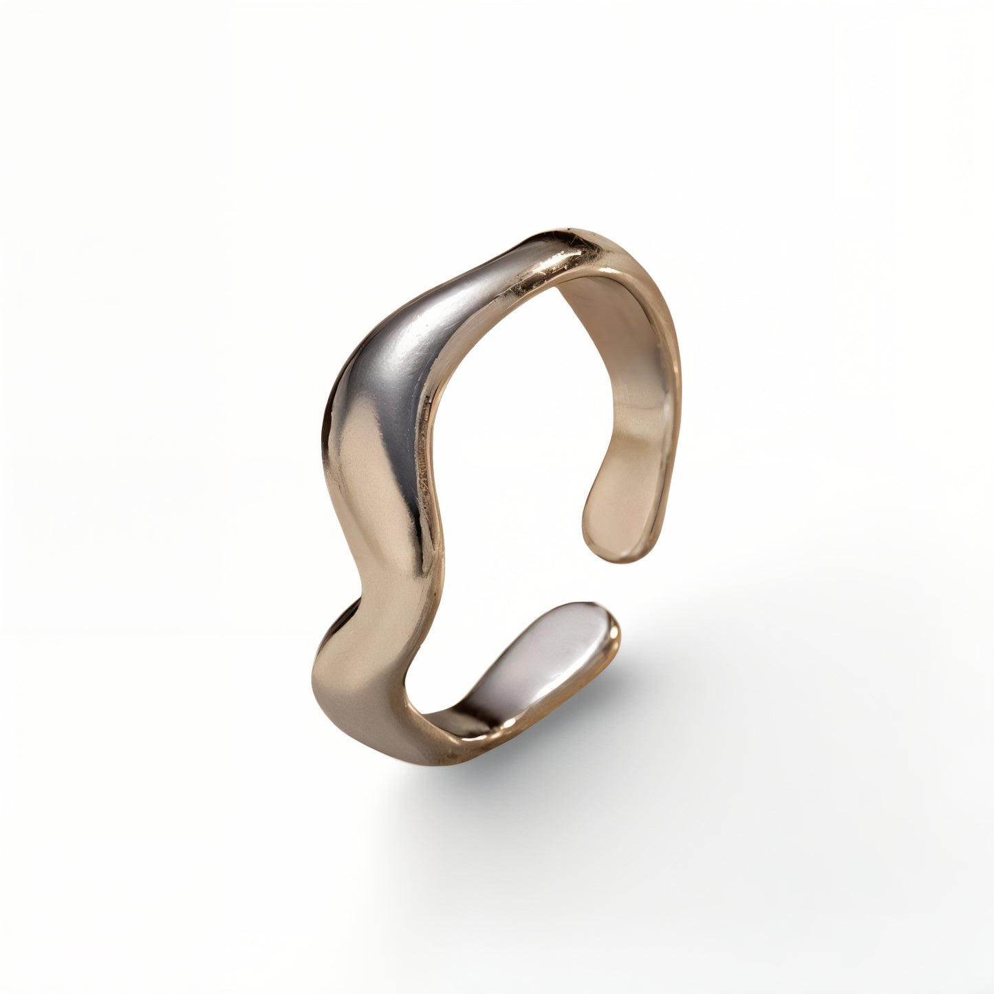 silver wavy ring on a white background