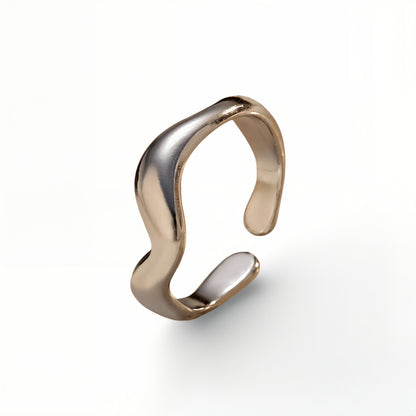 silver wavy ring on a white background