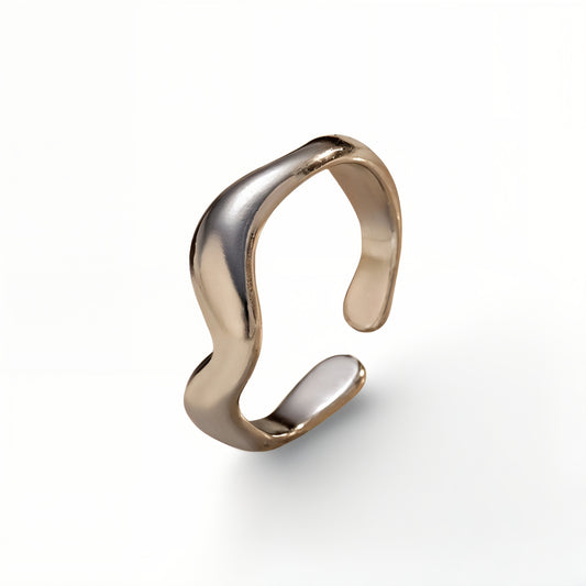 silver wavy ring on a white background