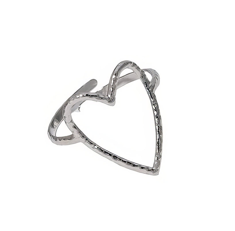 Silver heart-shaped ring on a white background